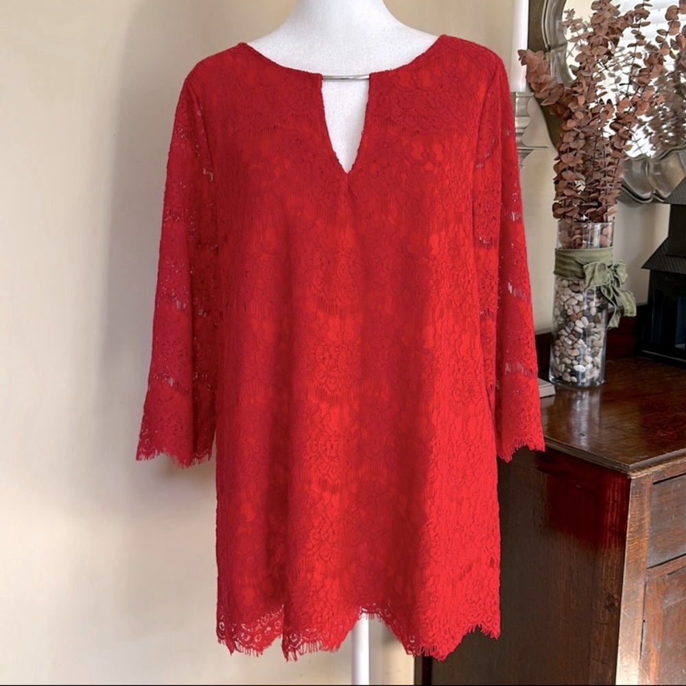 Cristina festive lace tunic in bright, holiday red. Decorative neckline. Size L